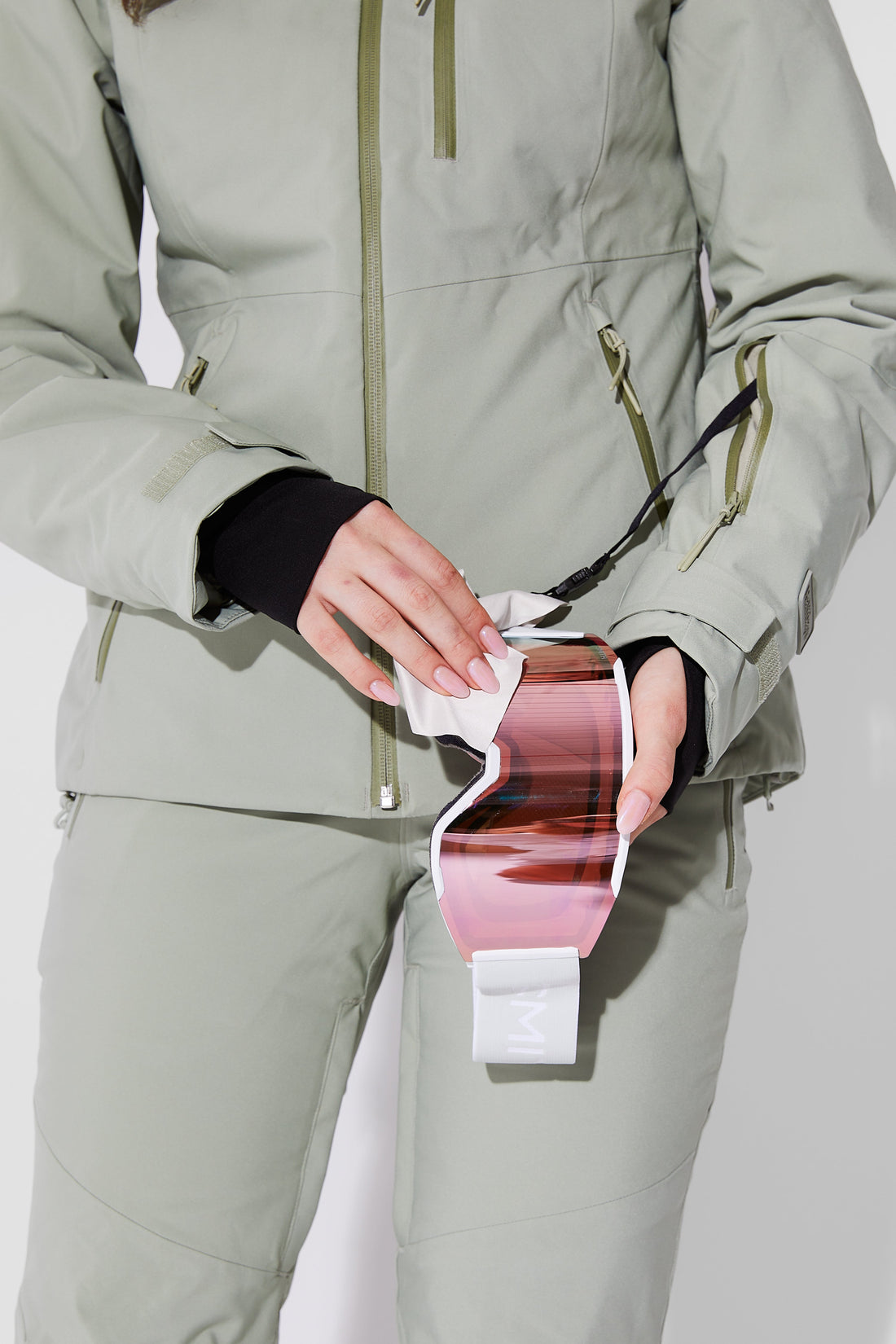 Woman wearing Sage ski jacket