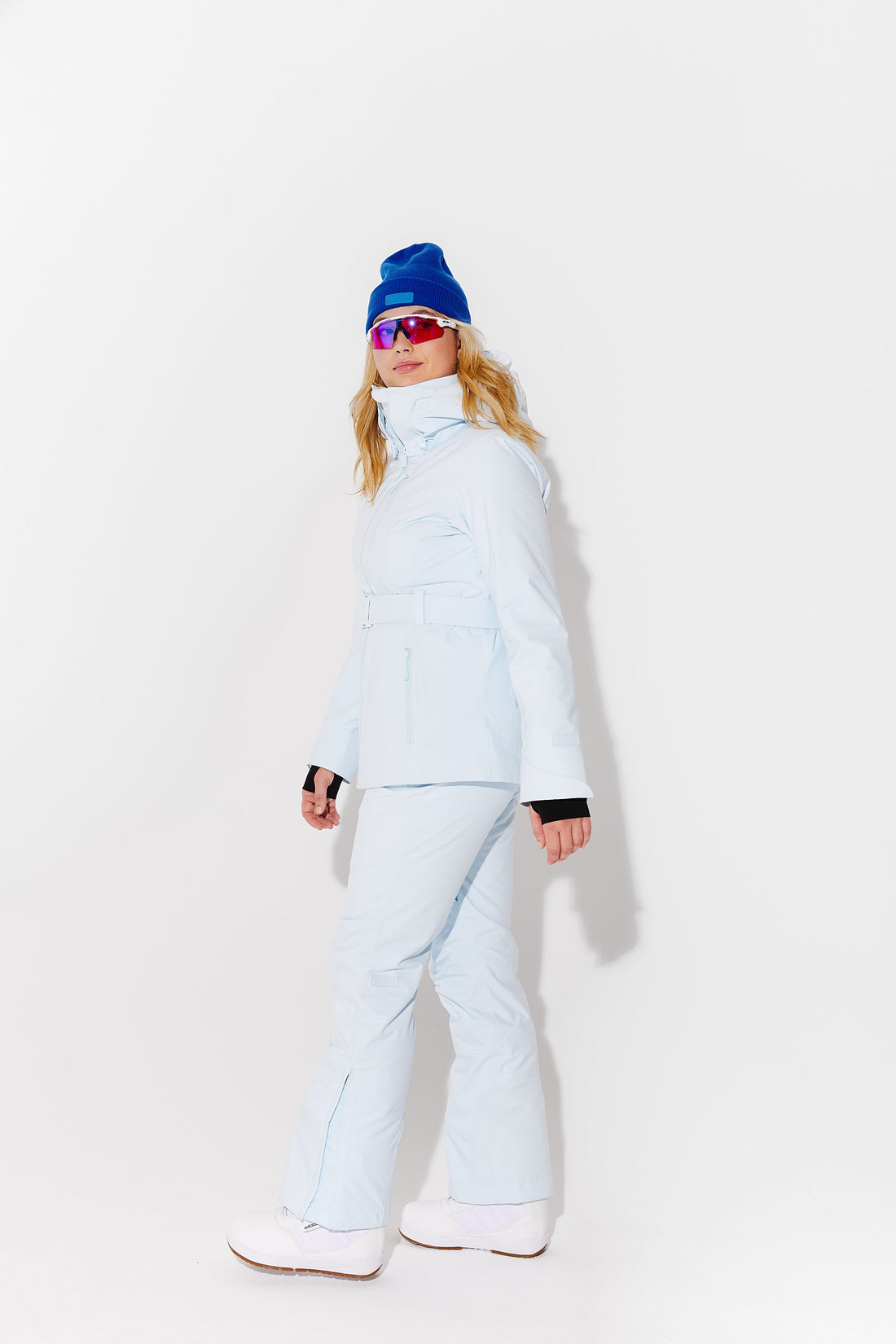 Woman wearing Frost belted jacket